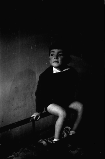 NiÃ±o sentado. Lechago